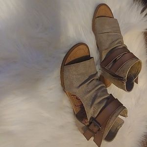 Tan gladiator sandals.